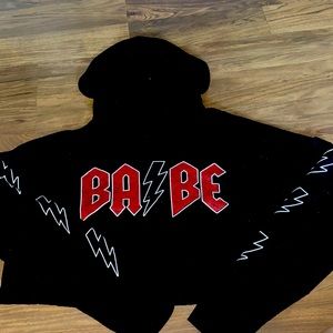 A black cropped hoodie.